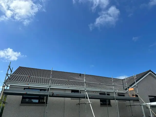 Completed slate roof by our Aberdeen roofers